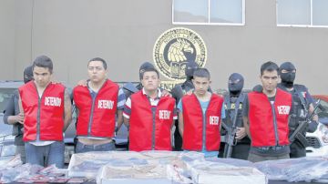 Supuestos Zetas detenidos en agosto pasado en Monterrey, México, en relación con el incendio del casino Royale.