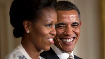 La primera dama, Michelle Obama, junto al  presidente Barack Obama.