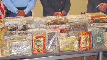 Parte de los 119 paquetes de cocaína incautados por las Autoridades.