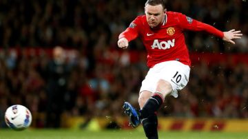 Un gol de Wayne Rooney le dio el triunfo al ManU sobre el Fullham.