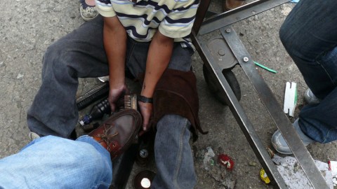 El menor presuntamente asesinado también era limpiabotas.