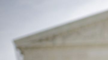 Manifestantes se expresaron en defensa de la reforma del sistema de salud frente al edificio de la Corte Suprema de Estados Unidos el pasado 28 de marzo de 2012.