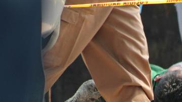 Cuerpos de varios de los reclusos que perecieron  en el interior del Centro Penal de San Pedro Sula.