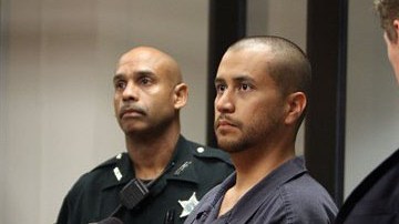 George Zimmerman (al centro) junto a su abogado, Mark O'Mara durante la vista celebrada hoy.