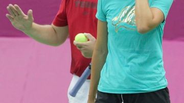 Maria Sharapova y su entrenador.