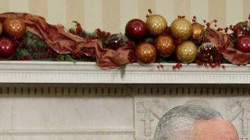 Colin Powell con el presidente Obama.
