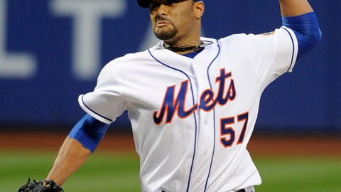 El abridor venezolano Johan Santana hace un lanzamiento en la segunda entrada del partido de ayer en Citi Field contra los Cardenales de San Luis.
