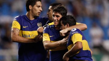 Los jugadores de Boca Juniors de Argentina festejan el triunfo de su equipo sobre el Fluminense de Brasil en Río de Janeiro el pasado 23 de mayo.