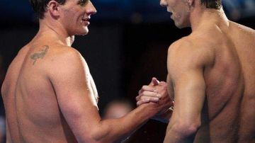 Ryan Lochte (izq.) y Michael Phelps (der.) en una foto del lunes 25 de junio de 2012.