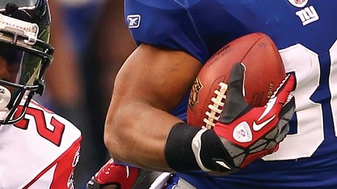 Póster interior autografiado de Víctor Cruz, el exitoso receptor de los Giants de Nueva York.