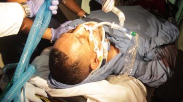 El expugilista puertorriqueño cuando era llevado en estado crítico al Centro Médico, en Río Piedras, tras ser baleado en Bayamón.