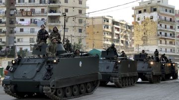 Extremistas ayudan a rebeldes sirios a tomar base Jeque Suleimán, ubicada al norte del país.