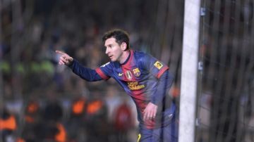 El argentino   Leo Messi  celebra el segundo gol del Barcelona en su victoria 2-0 sobre el Córdoba en el juego de ida por octavos de final de la Copa del Rey.