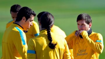 Sergio Busquets, José Manuel Pinto y Lio Messi (izq. a der.) practican con el conjunto  culé.