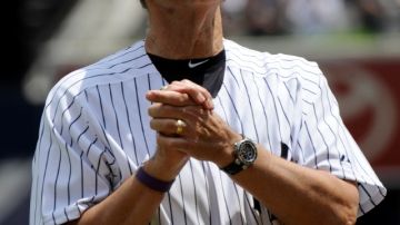 Joe Torre (izq), que guió a los Yankees de Nueva York a ganar cuatro títulos de Serie Mundial, hoy es manager de la selección de Estados Unidos. A la derecha, Edwin Rodríguez, el dirigente de Puerto Rico en el III Clásico Mundial de Béisbol.