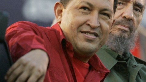 FILE - In this  July 21, 2006 file photo, Venezuela's President Hugo Chavez, left, gestures as Cuba's President Fidel Castro looks on during an event  in Cordoba, Argentina. Venezuela's Vice President Nicolas Maduro announced on Tuesday, March 5, 2013 that Chavez has died at age 58 after a nearly two-year bout with cancer. (AP Photo/Roberto Candia, File)