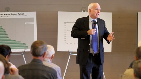 El senador S. Sen. John McCain, R-Ariz., speaks during a town hall, Tuesday, Feb. 19, 2013, in Sun Lakes, Ariz. McCain defended his proposed immigration overhaul to an angry crowd in suburban Arizona in the latest sign that this border state will play a prominent role in the national immigration reform debate. (AP Photo/Matt York)