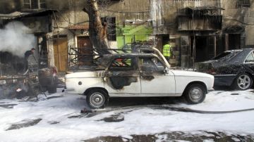 Daños causados por la caída de dos bombas lanzadas con morteros cerca del orfanato de Dar al Aman en Damasco, Siria, el 14 de marzo pasado.