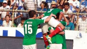 Jugadores de México celebran un gol ante Honduras.