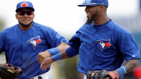 Melky Cabrera (izq.) y José Reyes, dos de las caras nuevas de los Azulejos de Toronto, favoritos para ganar su división.