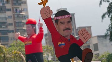 Un dibujo en cartón muestra a Nicolás Maduro en lucha por la presidencia que prácticamente le heredó el fenecido presidente Hugo Chávez.