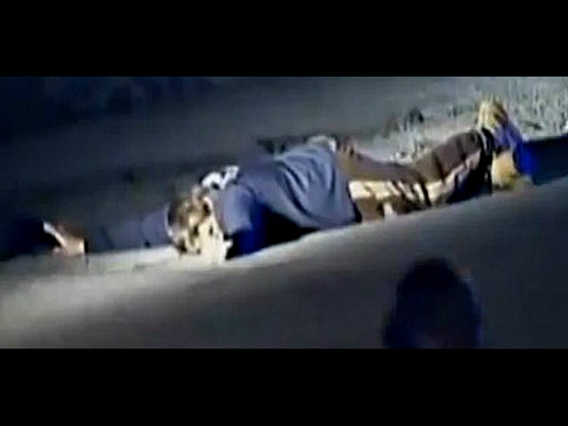 Imagen tomada de la televisión sobre el cuerpo del sospechoso 1, Tamelan Tsarnaev.