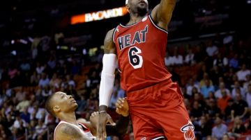 LeBron James y el Heat inician hoy la carrera para refrendar su título de la NBA.