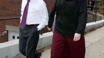 Katherine Russell, right, wife of Boston Marathon bomber suspect Tamerlan Tsarnaev, leaves the law office of DeLuca and Weizenbaum with Amato DeLuca, left, Monday, April 29, 2013, in Providence, R.I. (AP Photo/Stew Milne)