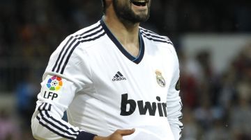 Raúl Albiol abrió la goleada del Real Madrid de 6-2 sobre el Málaga.