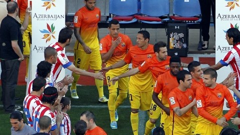 Atlético de Madrid le hizo calle de honor el domingo al Barcelona, nuevo campeón  español, a falta de tres fechas para terminar la liga.