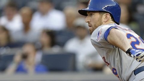 Ike Davis produjo dos carreras para los Mets.