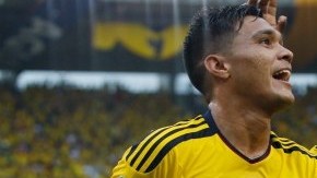 Teofilo Gutierrez celebra con Pablo Armero uno de los dos goles del triunfo de Colombia sobre Perú