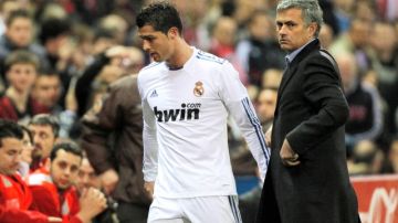 Cristiano Ronaldo (izq) y Jose Mourinho, cuando dirigía al Real Madrid.