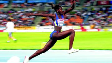 La atleta colombiana Catherine Ibargüen tiene una mejor marca personal de 14,99 metros, conseguidos en el 2011 en la altura de Bogotá, y se llevó el bronce mundial ese año en Daegu, Corea del Sur.