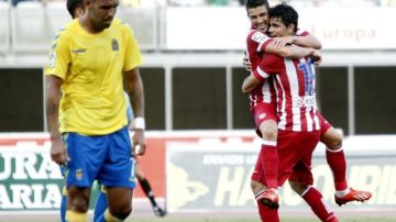David Villa celebra su primer gol con la playera del Atlético de Madrid