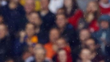 Lukas Podolski celebra una de sus dos anotaciones en el triunfo del Arsenal.