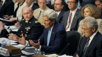 Los secretarios de Estado, John Kerry,   de Defensa, Chuck Hagel, y el jefe del Estado Mayor, Martin Dempsey, en el debate.