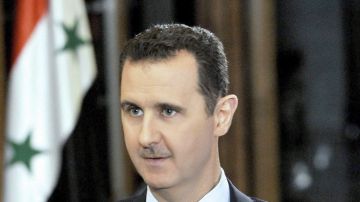 Bachar al Assad exigió a Washington que deje de amenazar a los sirios como condición para entregar sus armas químicas.