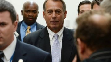 El presidente de la Cámara, el republicano John Boehner (c.) es uno de los políticos afectados tras el cierre gubernamental.