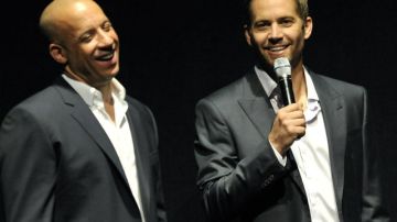 Vin Diesel (izqda) y Paul Walker trabajaban en la película “Fast and Furious 7, que se iba a estrenar en julio de 2014.