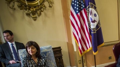 El presidente de Colombia, Juan Manuel Santos Calderón (centro), la canciller colombiana Maria Ángela Holguín (izquierda) y el presidente de la Cámara de Representantes de Estados Unidos, John Boehner (derecha), antes de su reunión en el Capitolio.