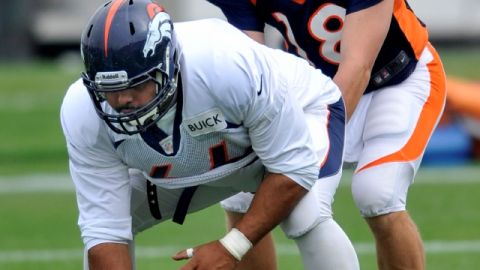 Manny Ramírez (izq.) y no es el pelotero dominicano, y Peyton Manning, el mariscal de campo de los Broncos, se entienden de maravilla.
