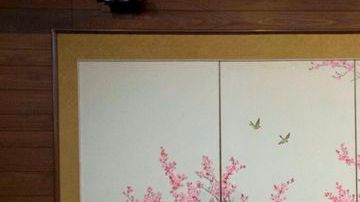 Dennis Rodman junto a parte de su equipo de exjugadores de la NBA.