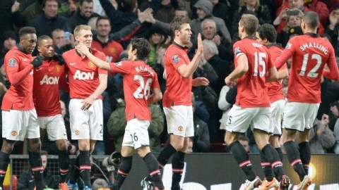 Los jugadores del Machester United celebran en Old Trafford su primer triunfo del año