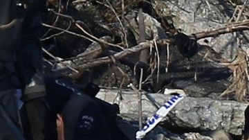 La Policía realiza las investigaciones en la zona del río Este, en la orilla de Queens, donde se encontraron los restos humanos.