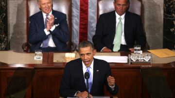 El vicepresidente de EEUU, Joe Biden (izq. atrás), y el presidente de la Cámara de Representantes, John Boehner (der.), durante el quinto discurso anual  del presidente Barack Obama  sobre el Estado de la Unión ante el Congreso, en el que dedicó sólo segundos al tema migratorio.