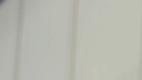 Putin en la tribuna, acompañado del presidente de Eslovaquia Ivan Gasparovic y el primer ministro ruso Dmitry Medvedev.