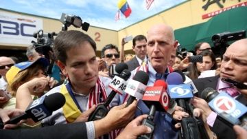 Rick Scott abogó por congelar las cuentas bancarias "de Maduro y su pandilla".