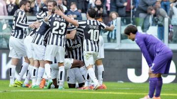 Los jugadores de Juventus celebran el gol del triunfo 1-0 sobre la Fiorentina.