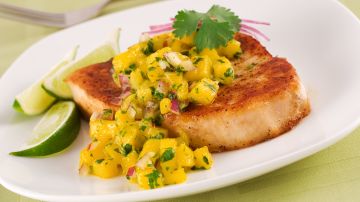 Spicy mango salsa is fantastic served with corn chips, but the possibilities go far beyond that.